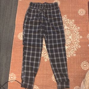Cuffed black plaid pants